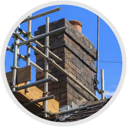 chimney with scaffolding, North East - Chimney Repairs