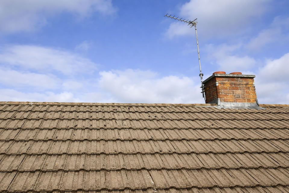 services-04 tile roof with a chimney