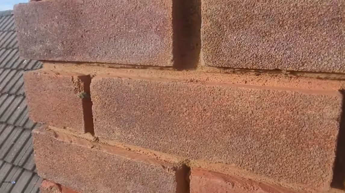 repointed chimney in progress